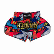 Colorful Muay Thai shorts with abstract patterns and text on a white background