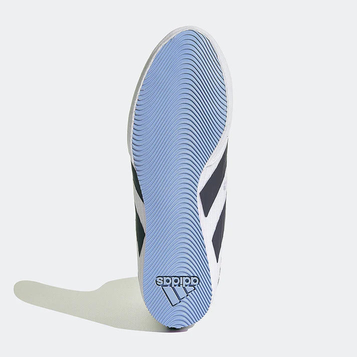 light blue sole of boxing shoes with Adidas logo on the heel