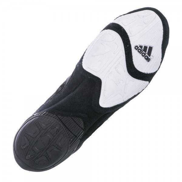 Black and white Adidas shoe on a white background