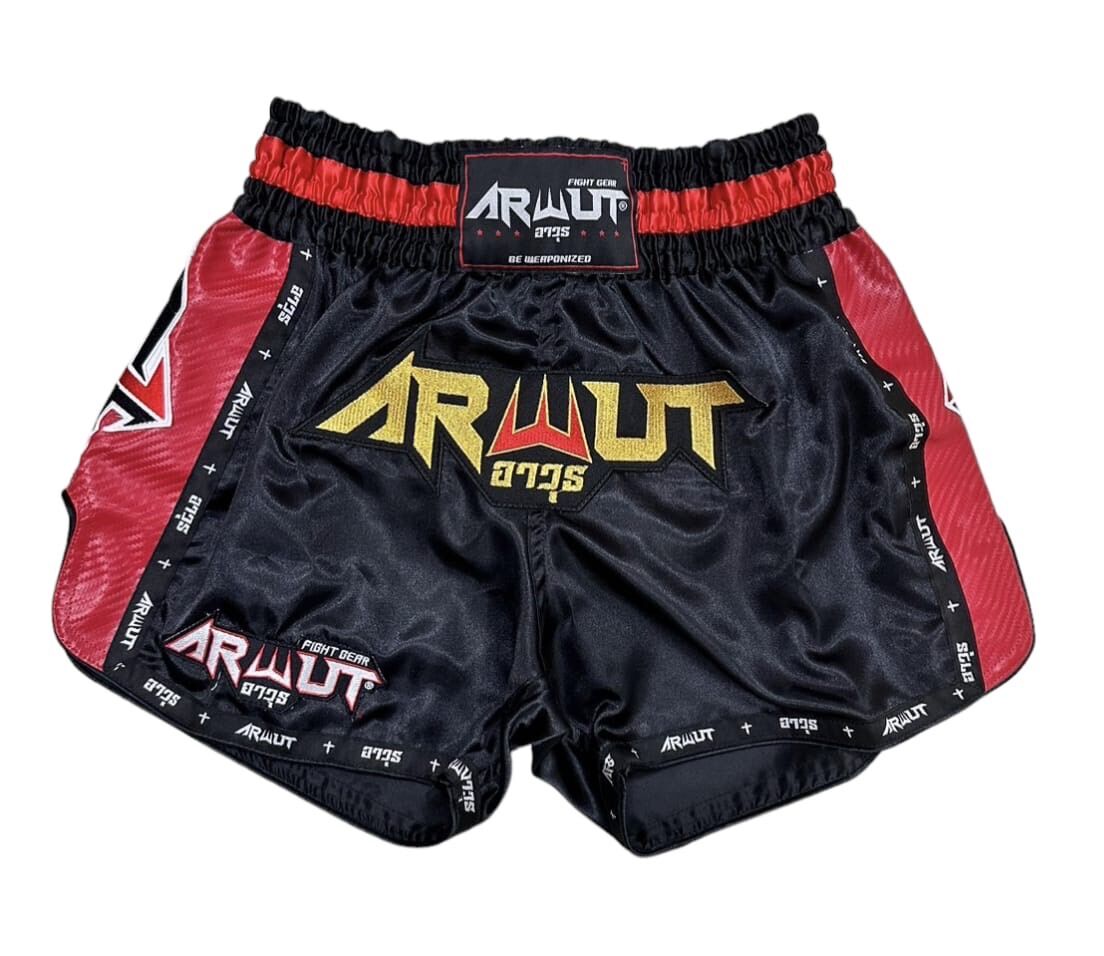 Black and red Arwut Thai shorts with brand logo on a white background