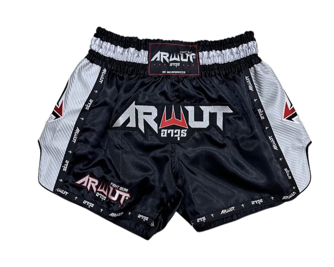 Black and gray Muay Thai shorts with 'Arwut' branding on a white background