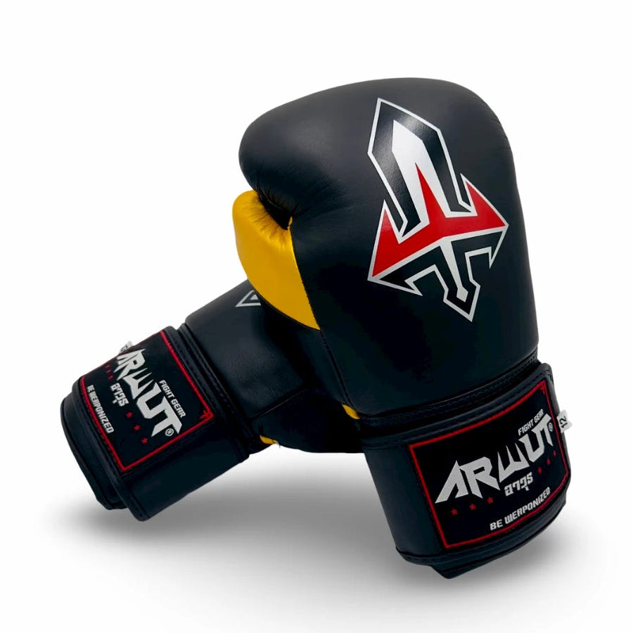 Black and gold boxing glove with red and white logo on a white background