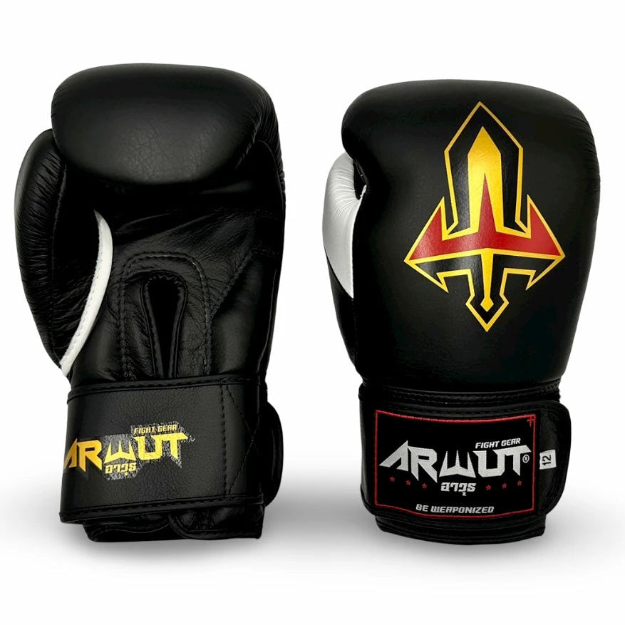Black and white boxing gloves with a yellow and red logo on a white background