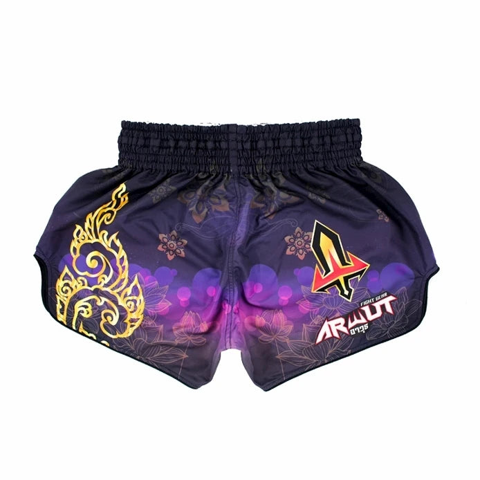 Purple Muay Thai shorts with floral patterns and a brand logo on a white background