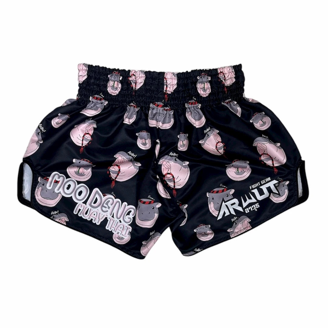 Black Muay Thai shorts with graphic designs and text on a white background