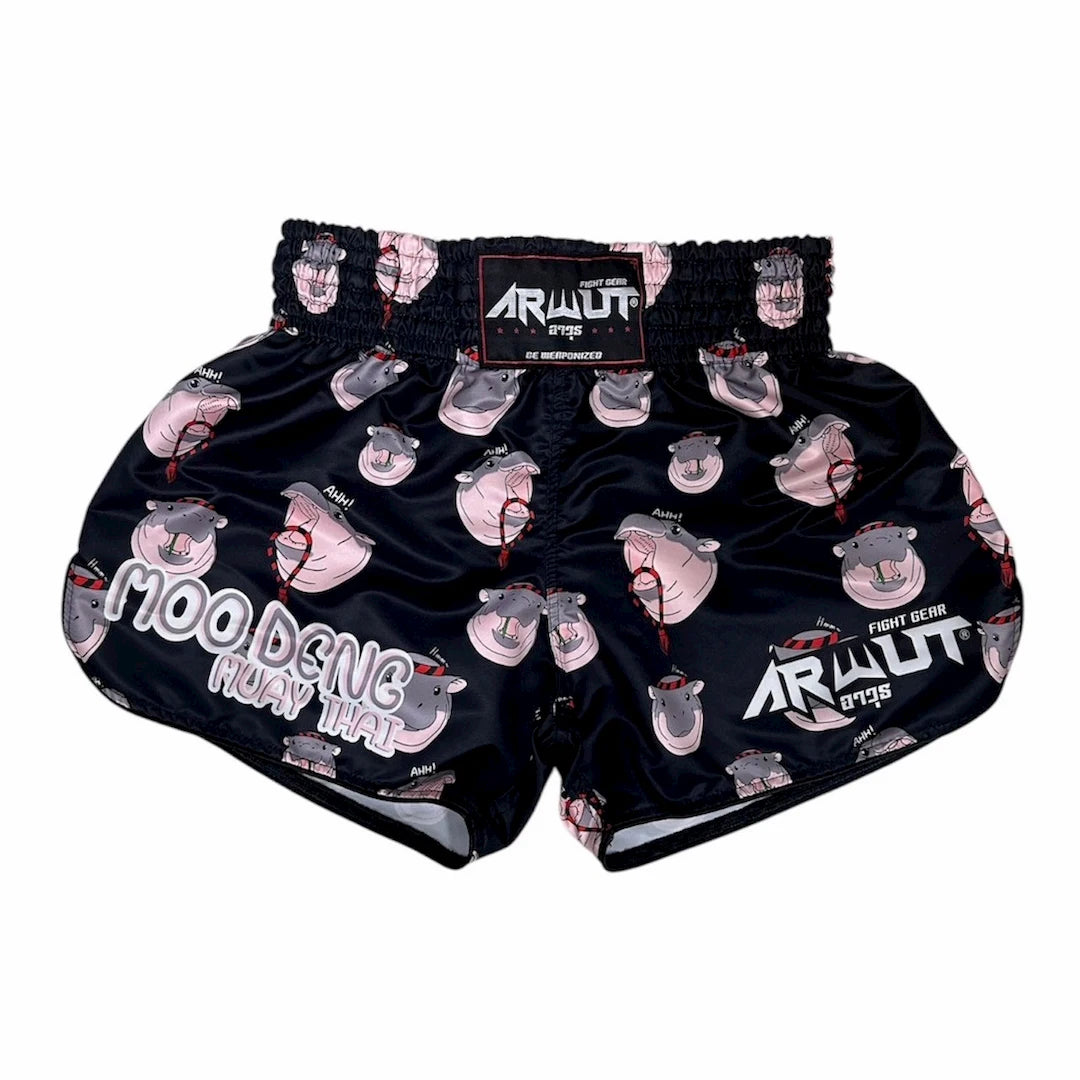 Black Muay Thai shorts with graphic designs and branding on a white background