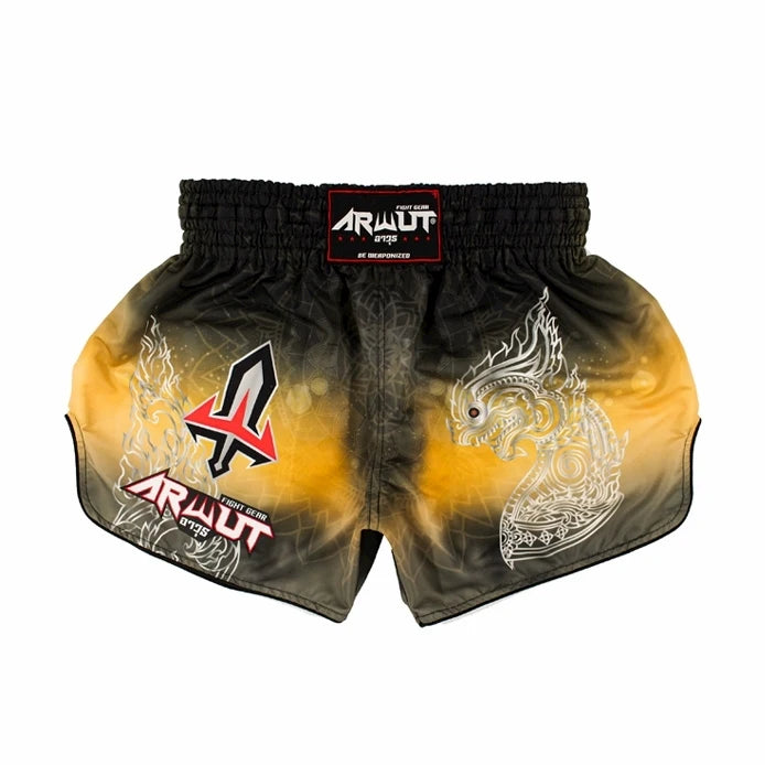 Black and yellow Muay Thai shorts with brand logo on a white background