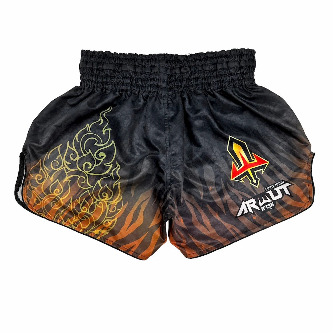 Black and orange Muay Thai shorts with a logo and text on a white background