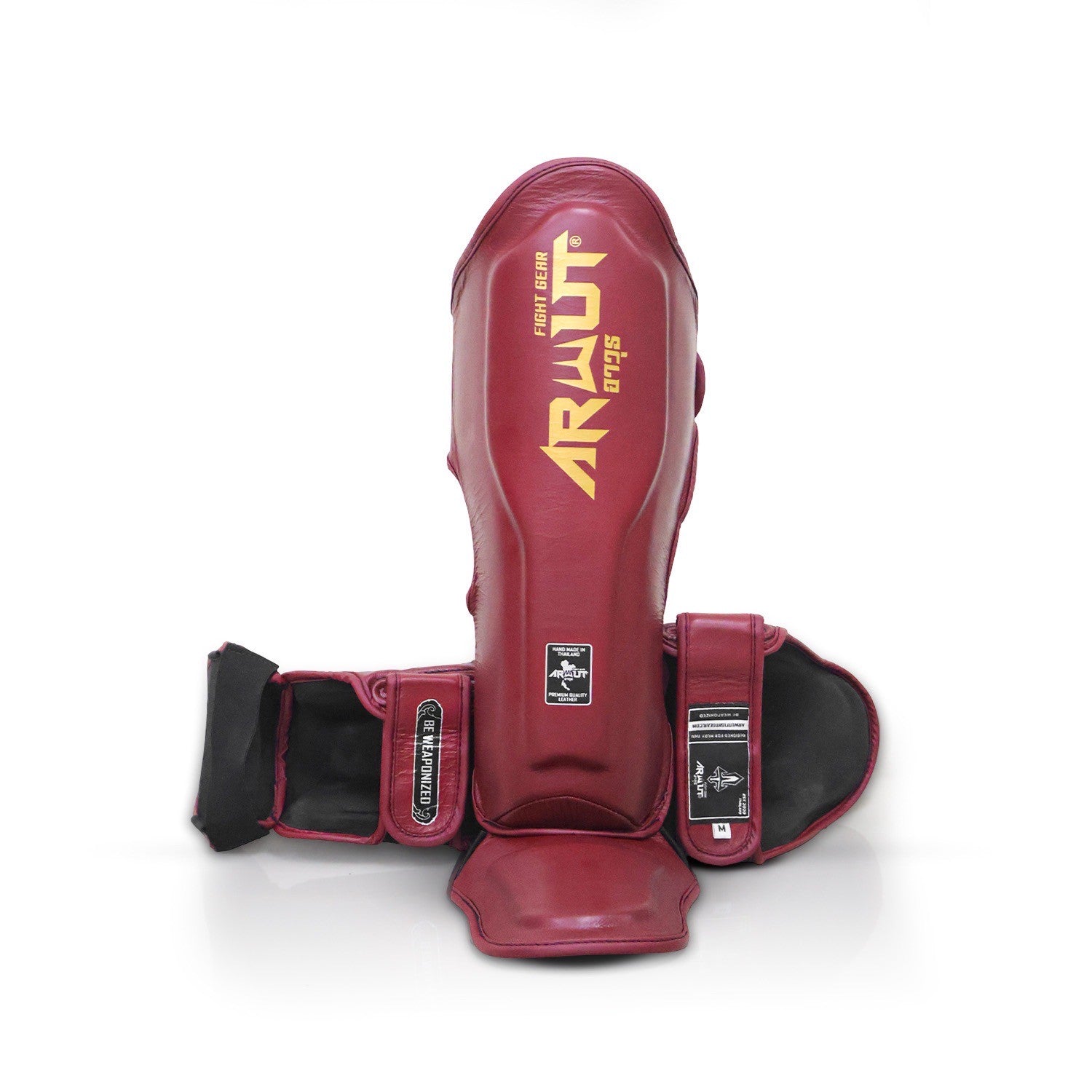 Red shin guards with 'Arwut' branding on a white background