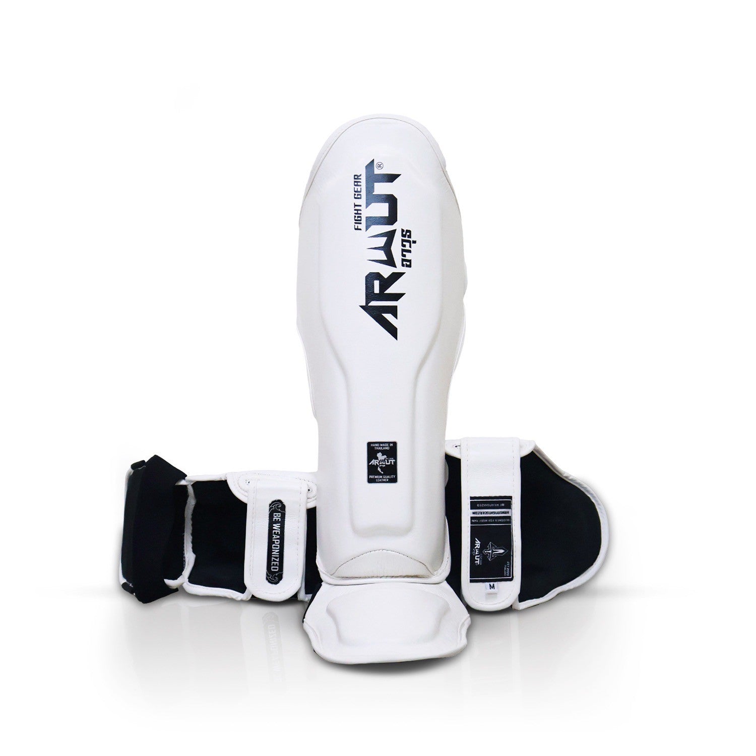 White Arwut shin guards with black accents on a white background