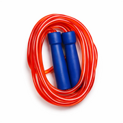 Coiled red jump rope with blue handles on a white background