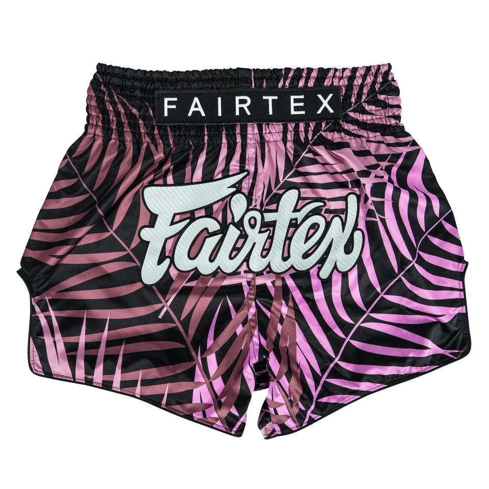 Pink and black patterned Fairtex shorts on a white background