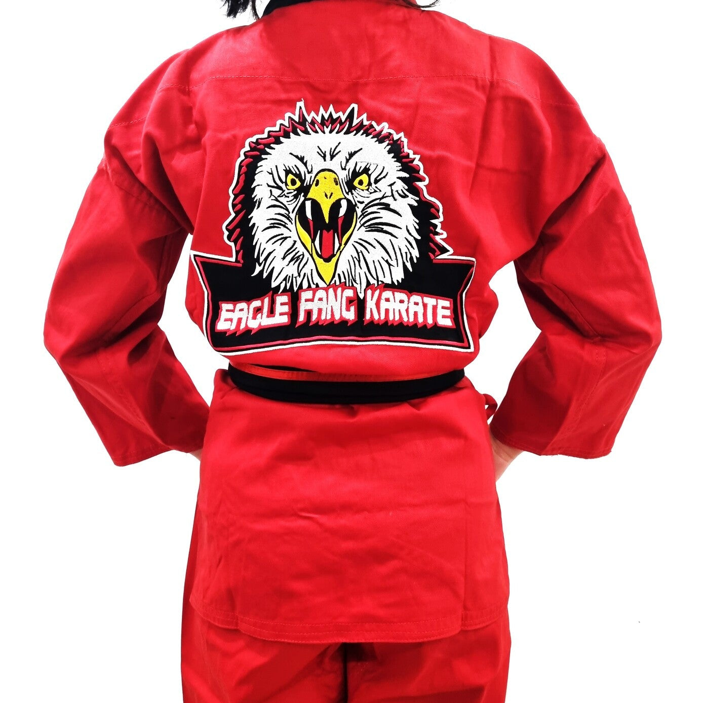 Red martial arts uniform with an eagle logo and 'Eagle Fang Karate' text on a white background
