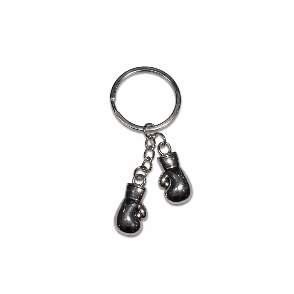 Metallic boxing glove keychain on a white background