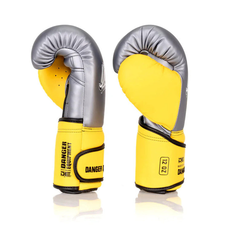 Pair of yellow and gray boxing gloves on a white background