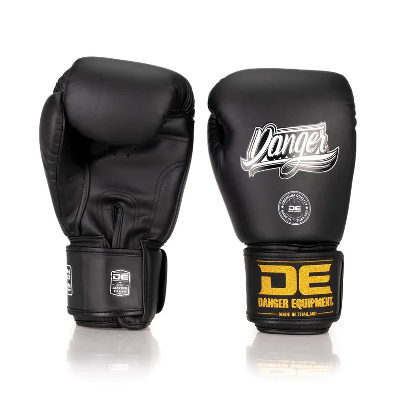 Black boxing gloves with 'Danger Equipment' branding on a white background