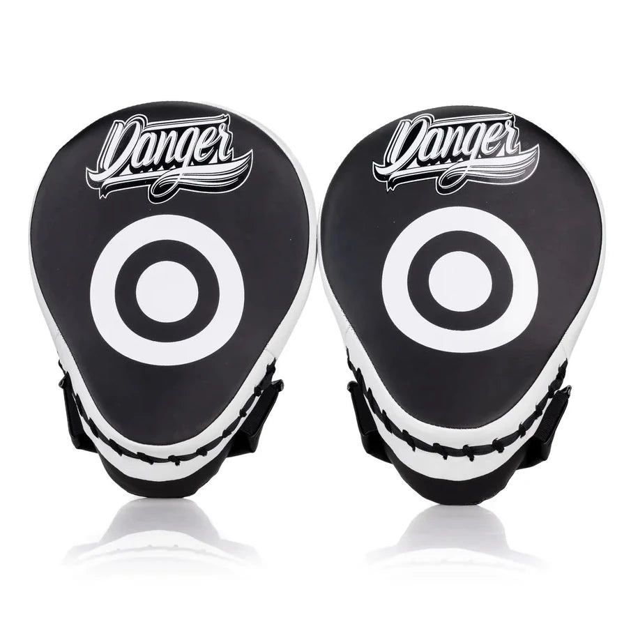 Pair of black and white focus mitts with 'Danger' branding on a white background