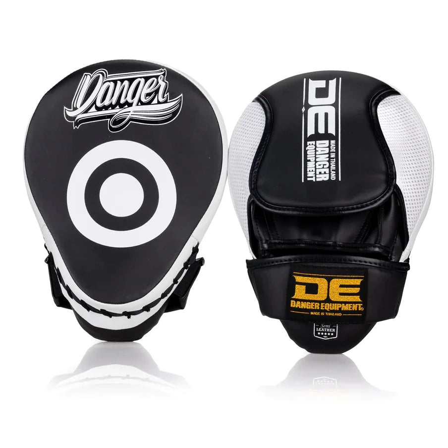 Black and white boxing mitts with target design and 'Danger Equipment' branding on a white background.