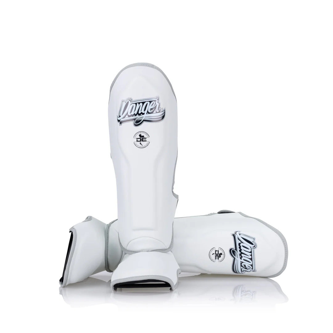 White shin guards with Danger logo on a white background