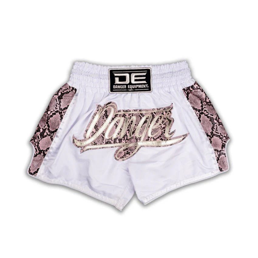 White boxing shorts with snake pattern and 'DE' branding on a white background