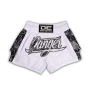 White shorts with black text and graphics on a white background