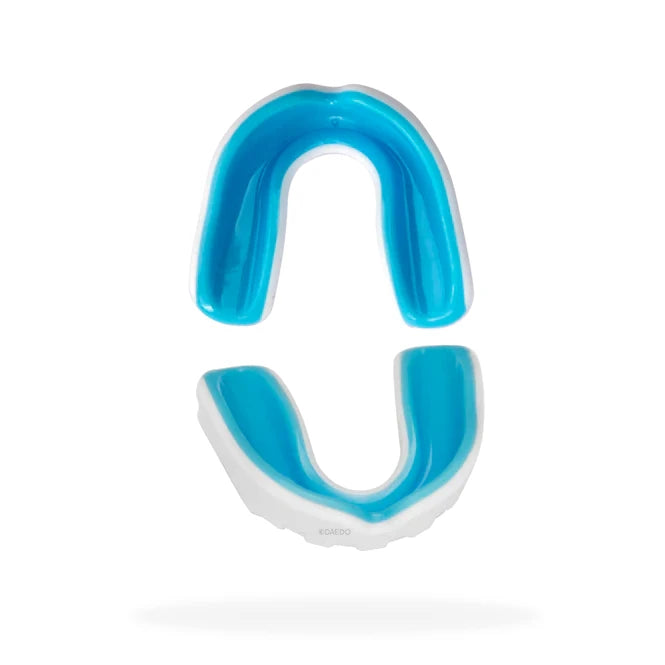 Blue and white Daedo mouthguard on a white background