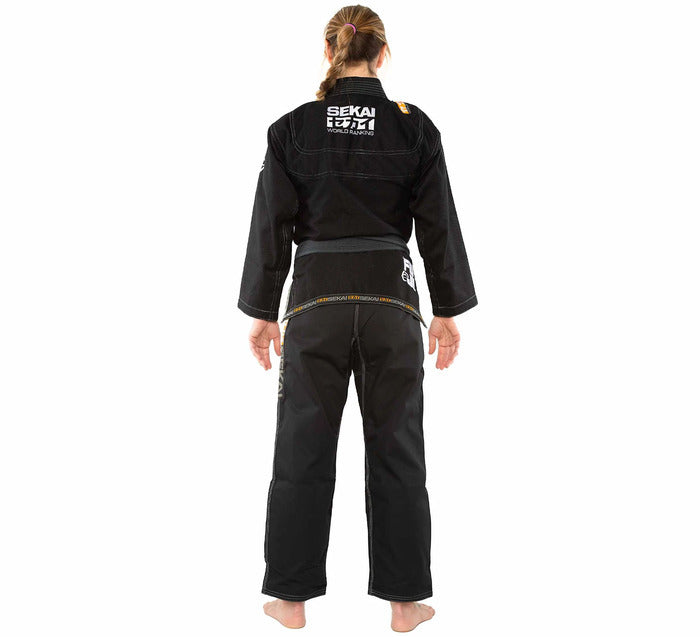Female wearing a black FUJI Sekai BJJ uniform on a white background