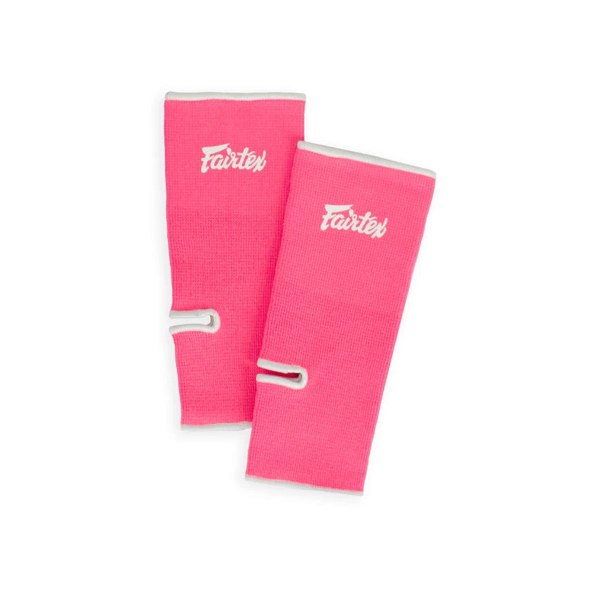 Two pink ankle guards with a brand logo on a white background