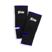 Pair of black ankle guards with blue accents on a white background