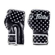 Black boxing gloves with white polka dots and Fairtex logo on a white background