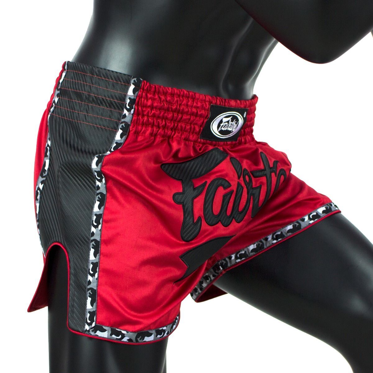 Red Muay Thai shorts with black and white accents on a mannequin against a white background