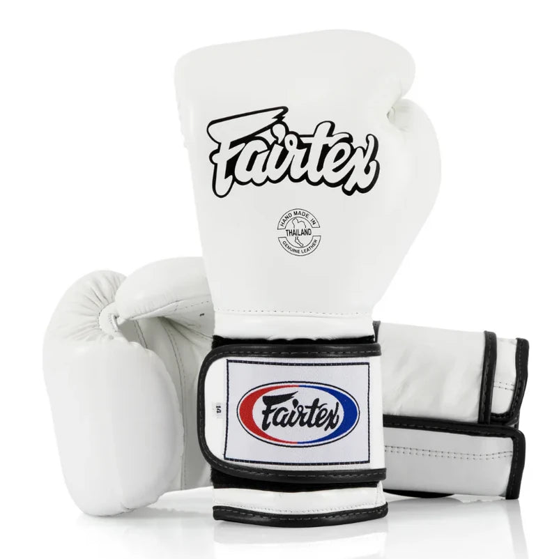 White boxing gloves with Fairtex logo on a white background