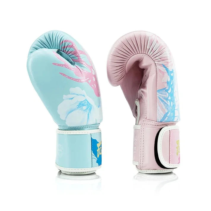 Pair of floral boxing gloves in light blue and pink on a white background