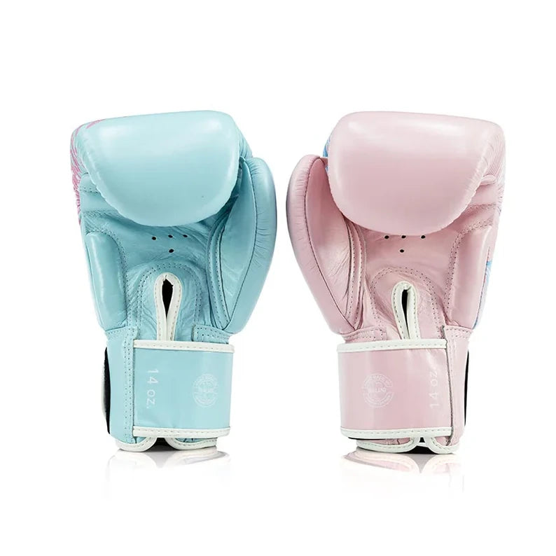 Pair of light blue and pink boxing gloves on a white background