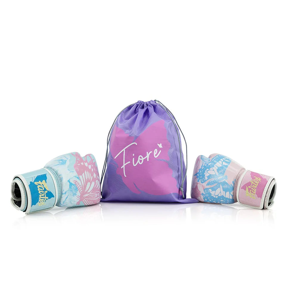 Purple drawstring bag with 'Fiore' branding, surrounded by two floral-patterned boxing gloves on a white background.