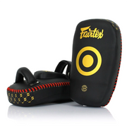 Black and yellow Fairtex Thai pads on a white background