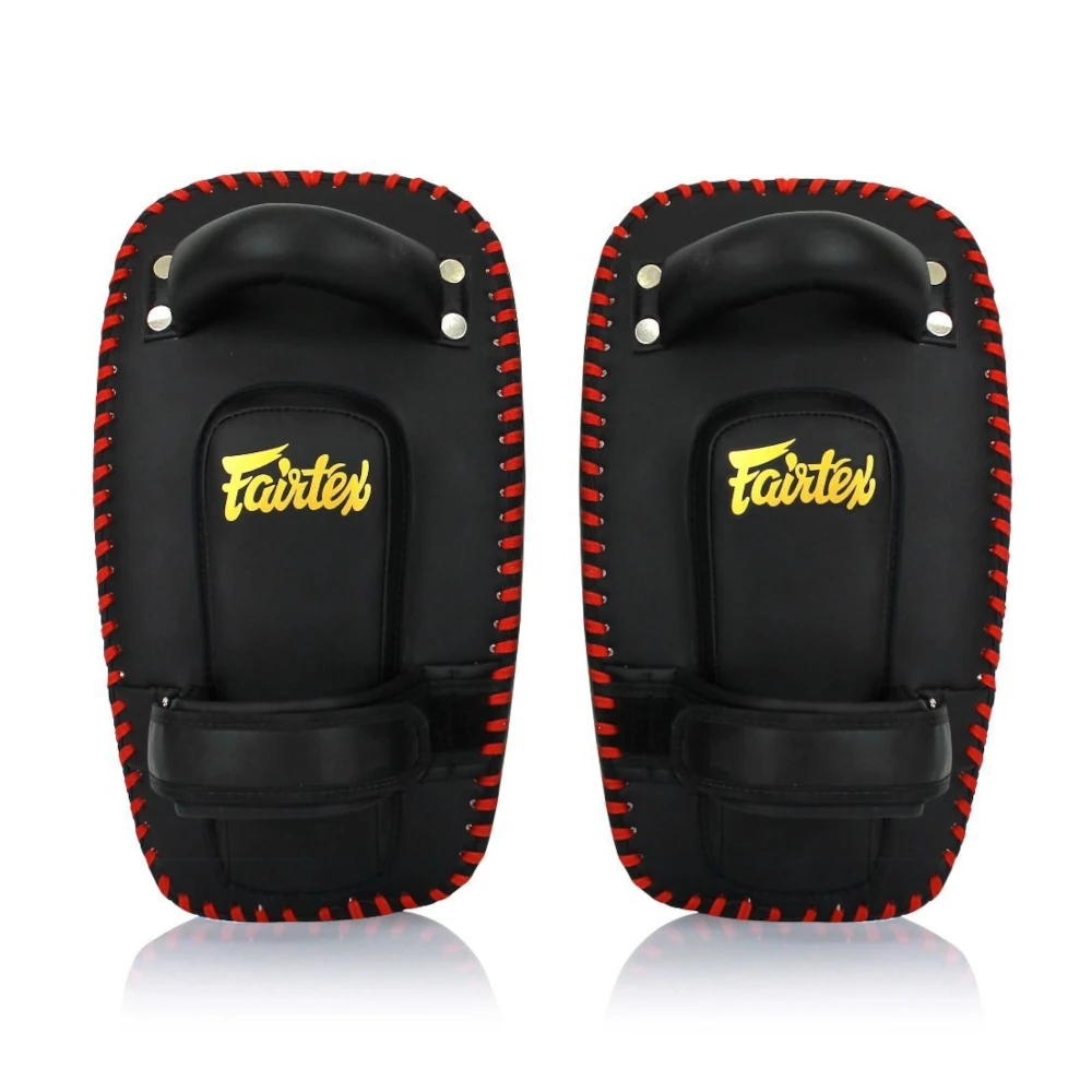 Pair of black and red Fairtex Muay Thai pads on a white background