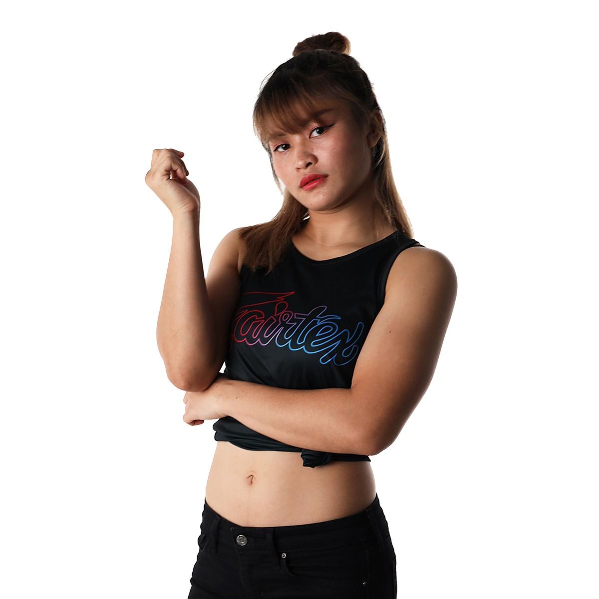 Stamp fairtex wearing a black tank top with a logo, posing against a white background