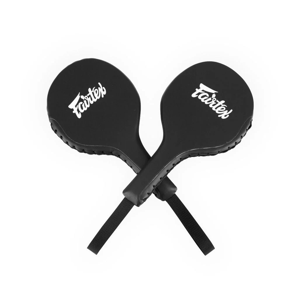 Two black boxing paddles with 'Fairtex' branding on a white background