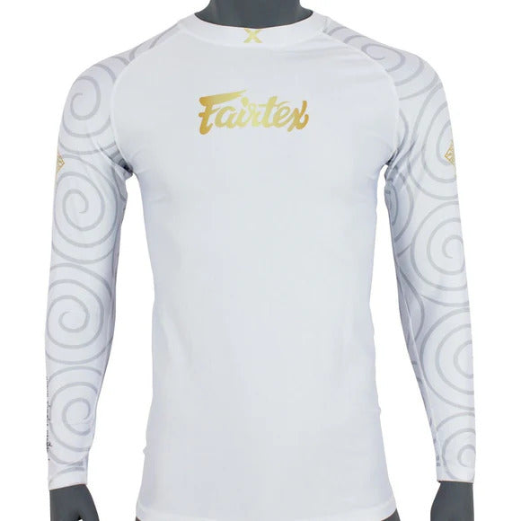 White compression rash guard with gold Fairtex logo on a mannequin against a white background