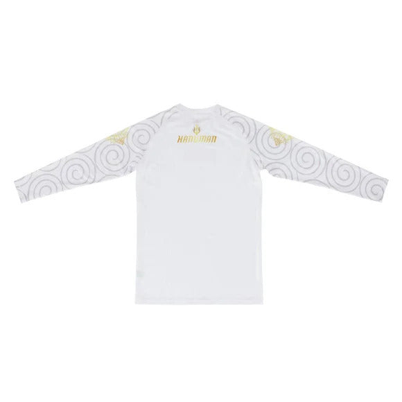 White long-sleeve rash guard with patterned sleeves on a white background