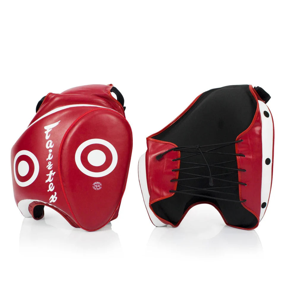 Red and black protective thigh pads with Fairtex branding on a white background