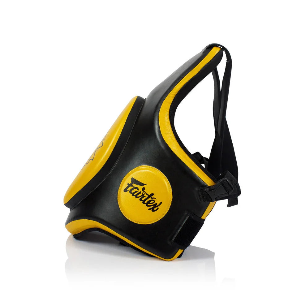 Black and yellow body protector with a visible Fairtex logo on a white background