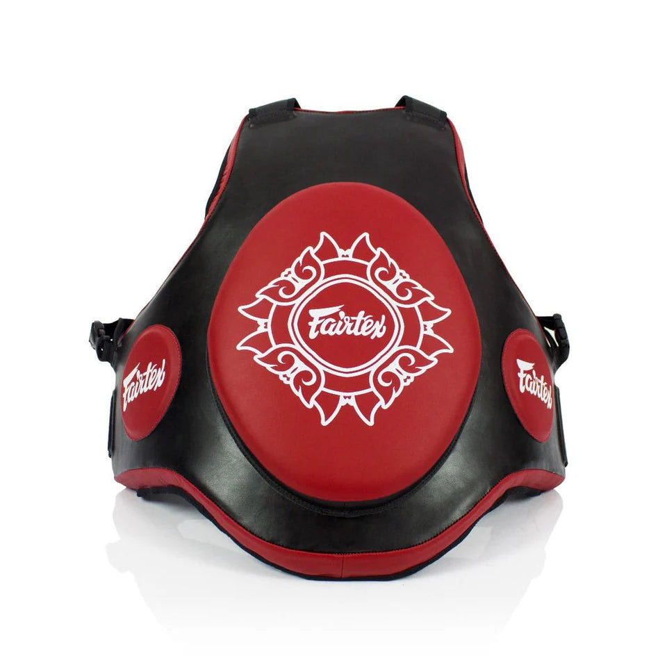 Black and red Muay Thai body pad with 'Fairtex' branding on a white background