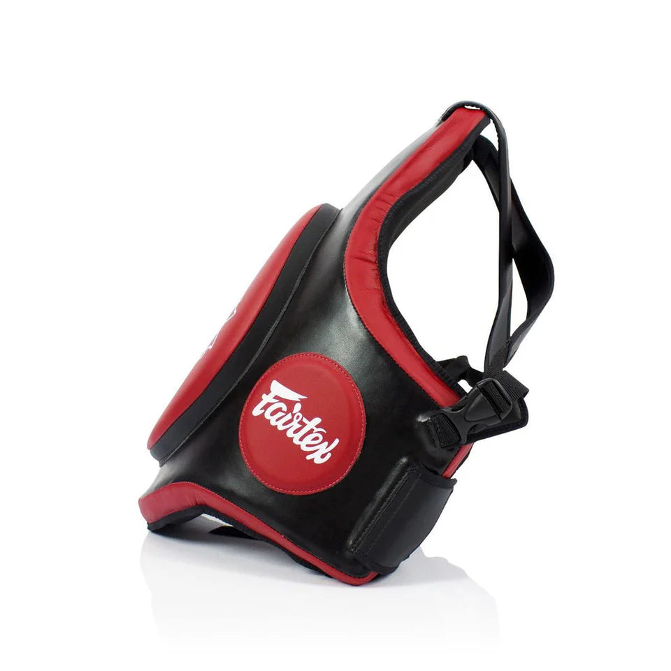 Side profile of Muay Thai body protector in black and red.