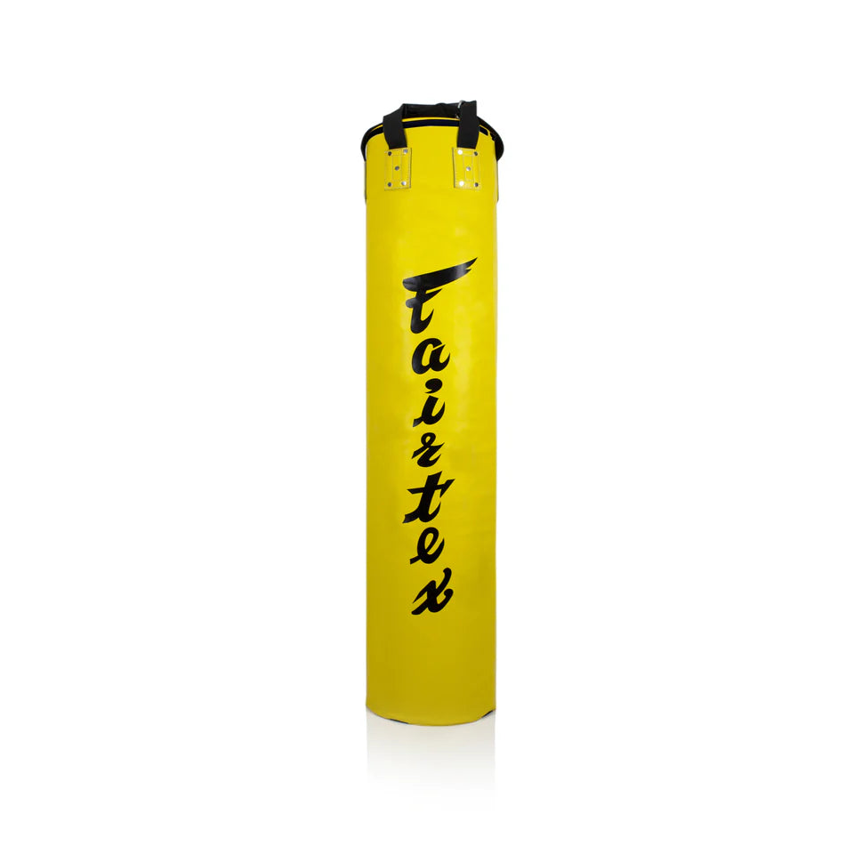 Yellow punching bag with 'Fairtex' branding on a white background