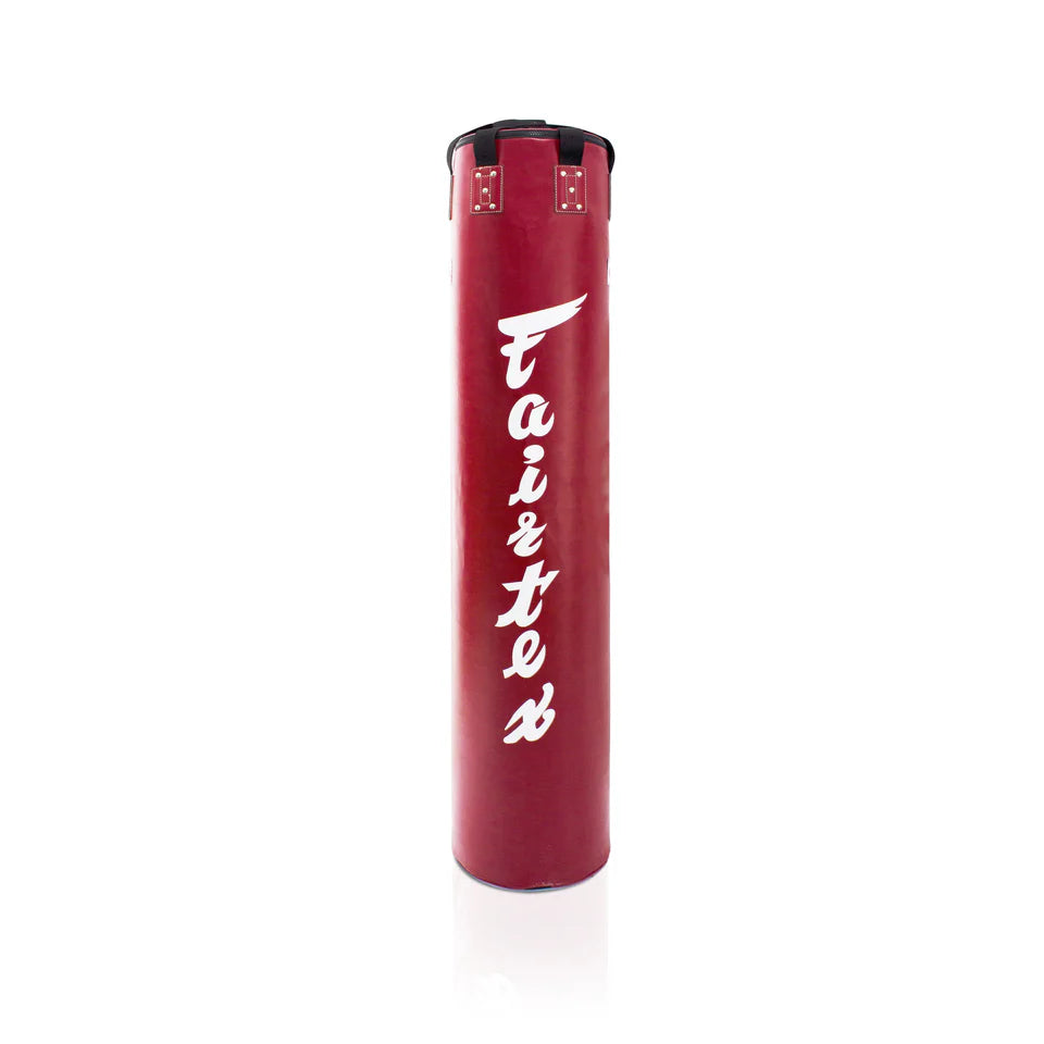 Red boxing bag with 'Fairtex' branding on a white background