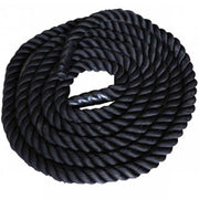 Coiled black fitness rope on a white background