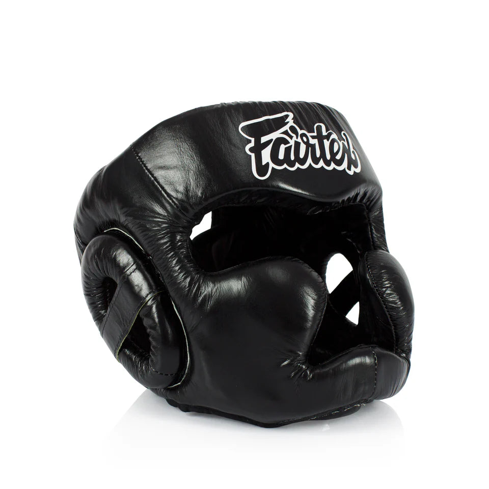 Black boxing headgear with 'Fairtex' branding on a white background