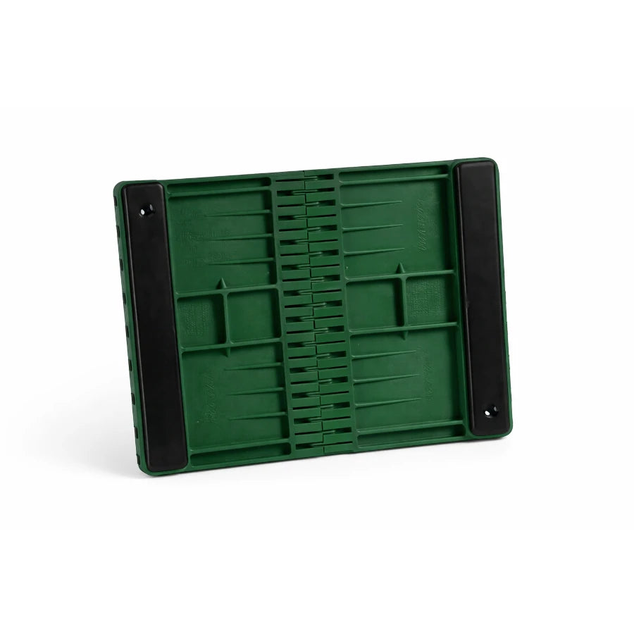 Green plastic breaking board with padding on a white background
